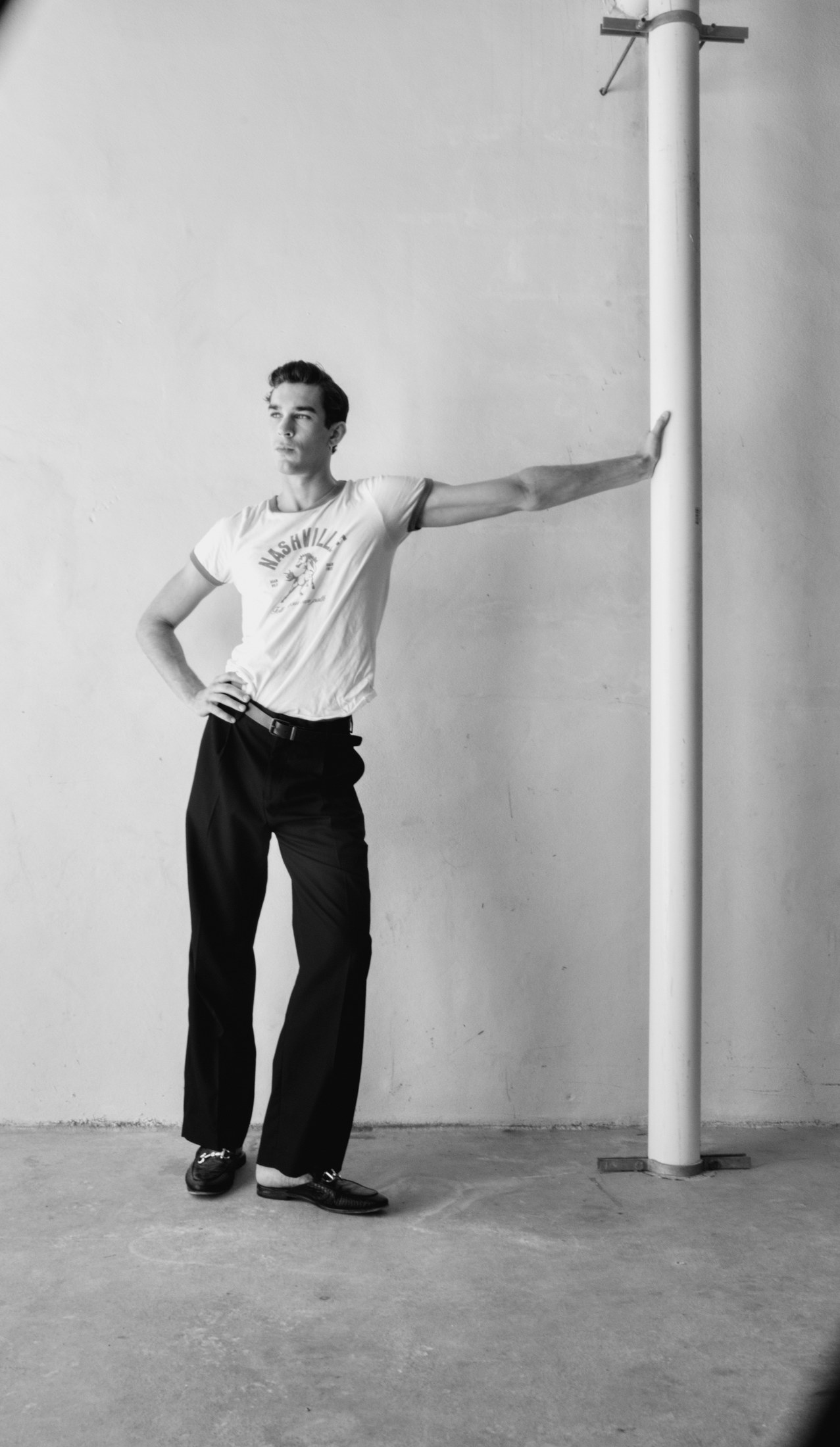 Black-and-white full-length menswear portrait